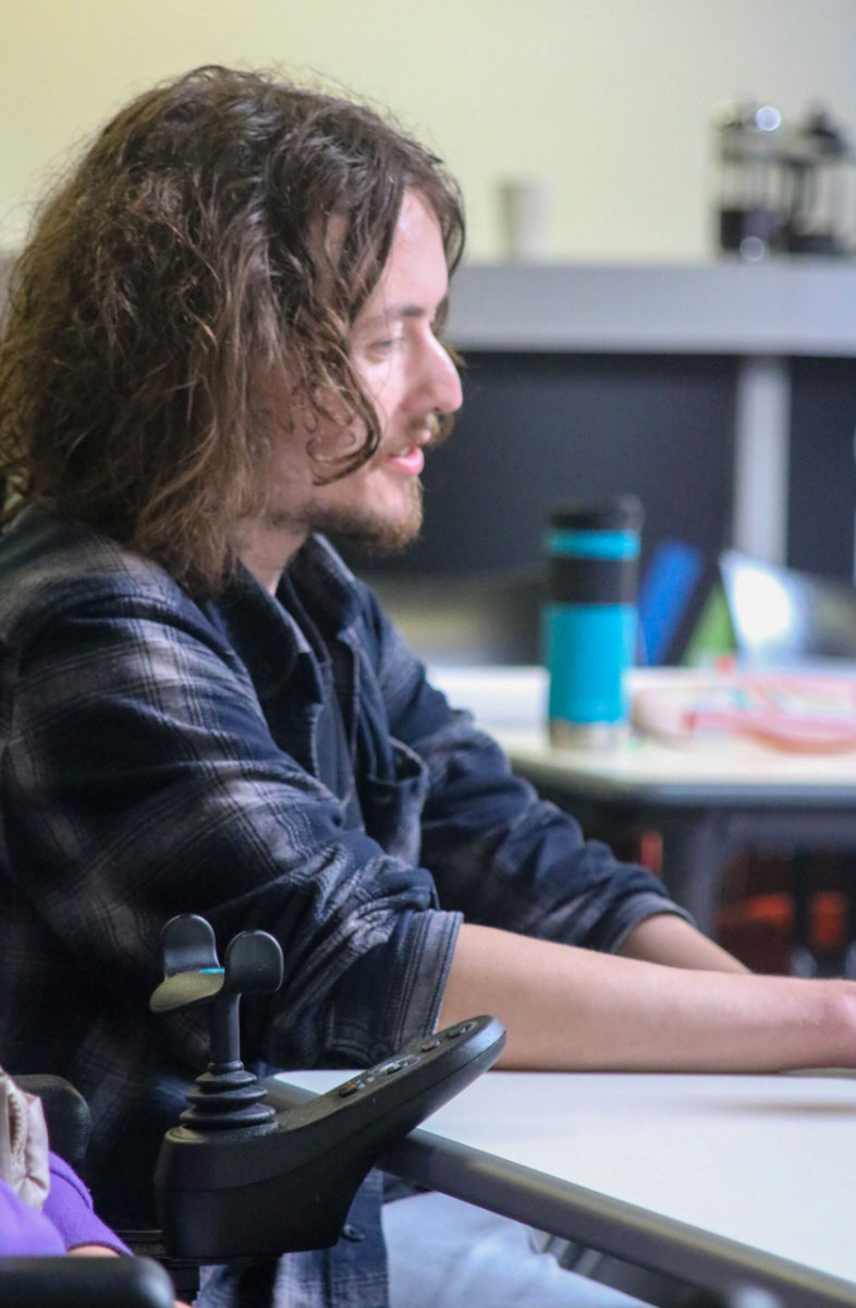 A young person from the You Can group working on a project. He is a film maker.